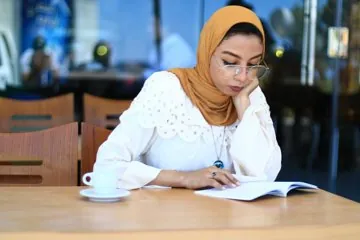 Woman studying for US Citizenship Test